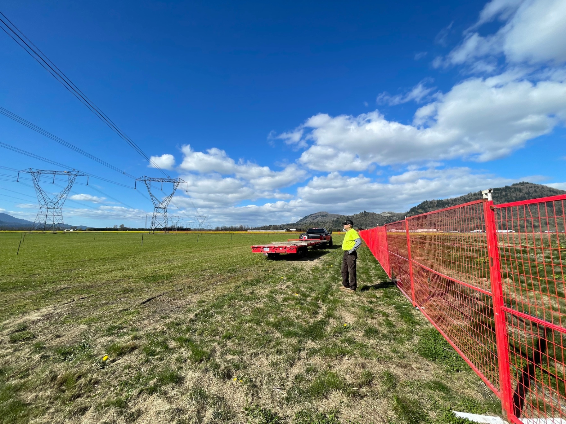 Alpenglow Site Services crew installing temporary fencing in the Fraser Valley
